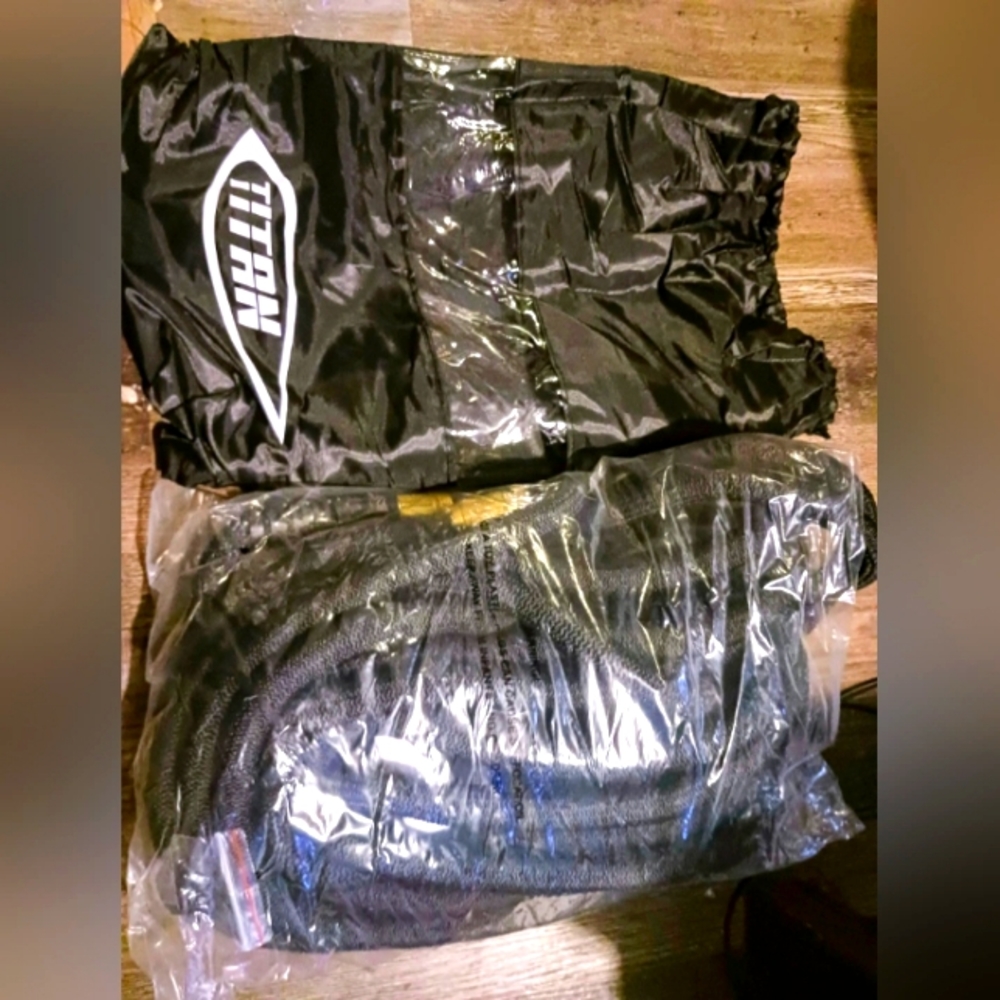 100ft Titan Garden hose triple core latex with jet nozzle and washers.